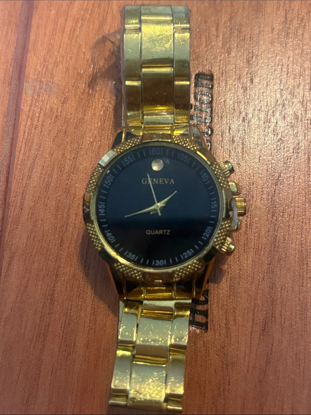 Geneva Gold Tone Watch with Black Dial
